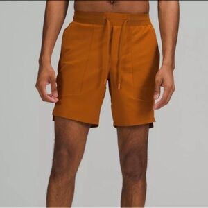 Men’s Lululemon License to Train 7” Linerless short. Size M. Rust color